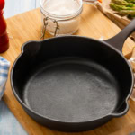 A clean cast iron skillet ready for cooking your next recipe.