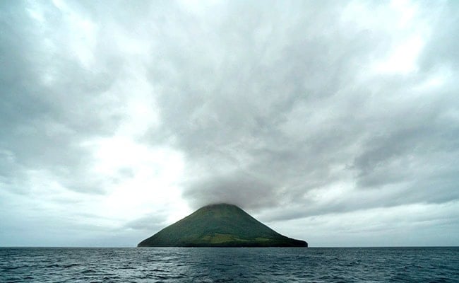 2024 Farmers' Almanac winter forecast was affected by the Tonga Volcano eruption, shown here releasing smoke and moisture into the clouds above.