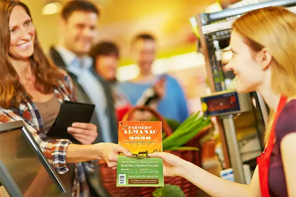 Farmers' Almanac wholesale copy being purchased at a retail store.