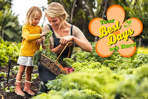 Farmers' Almanac gardening calendar best days represented by a woman harvesting vegetables with her daughter.