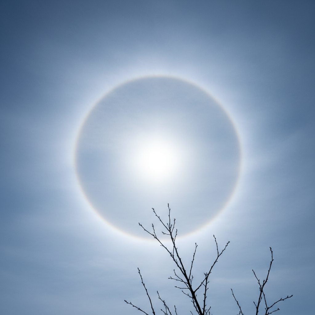A 22-degree halo around the sun in a high cirrostratus sky