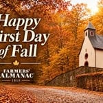 Scenic autumn landscape with a small church and colorful fall trees.