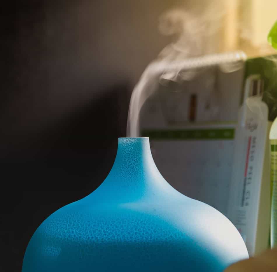 Humidifier emitting steam to increase indoor humidity levels.